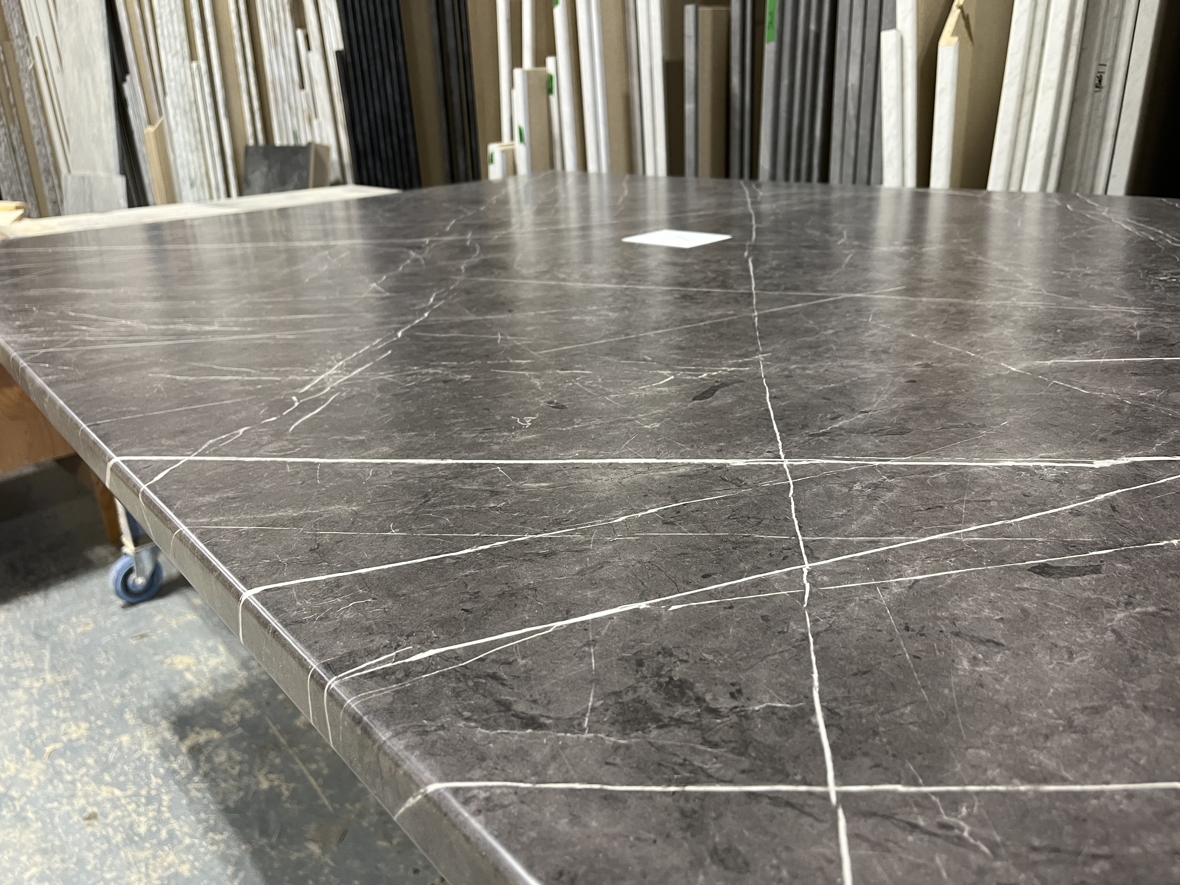 Fabricating postform laminate island in the shop, looks very much like a real soapstone